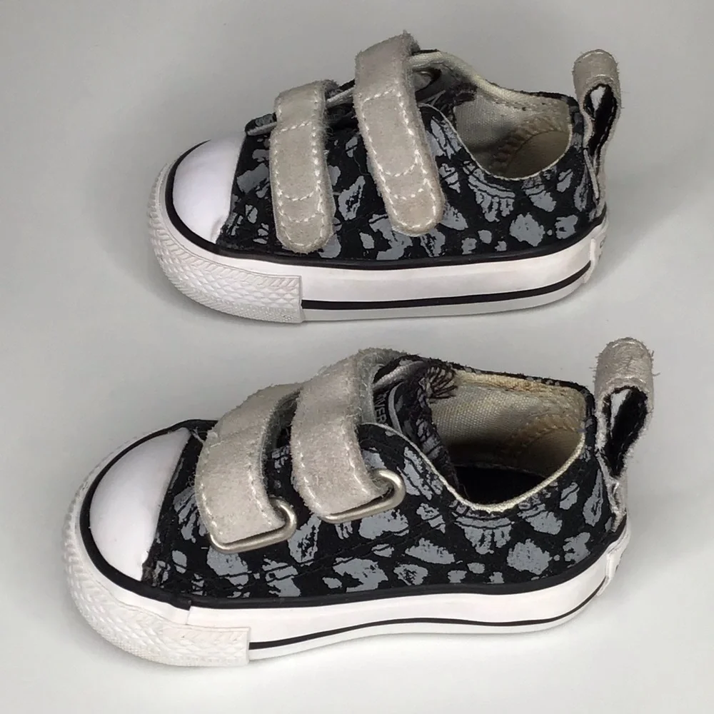 Converse Chuck Taylor All Star 2V Black and Gray Leopard Print Sneakers.